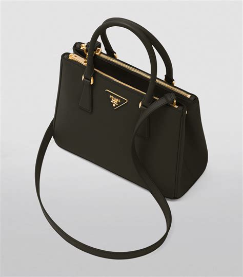 prada small camera top handle bag|Prada bags selfridges.